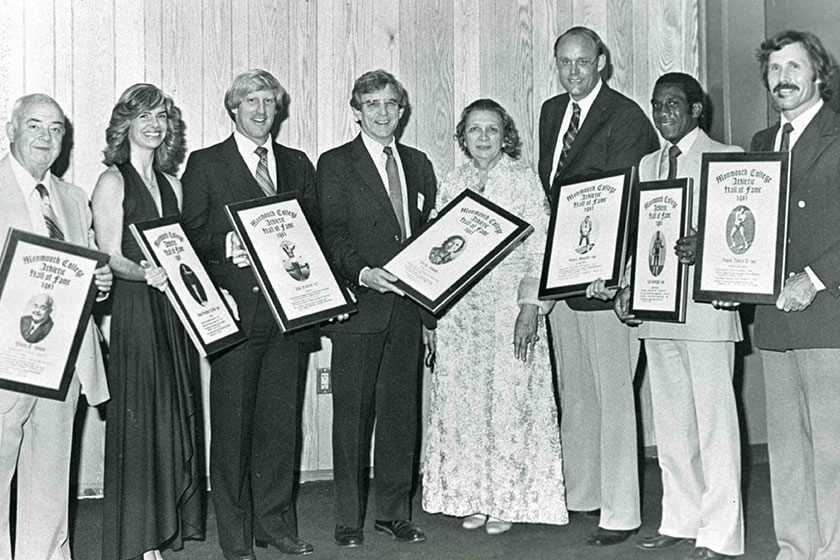 Hall of Fame winners holding their awards