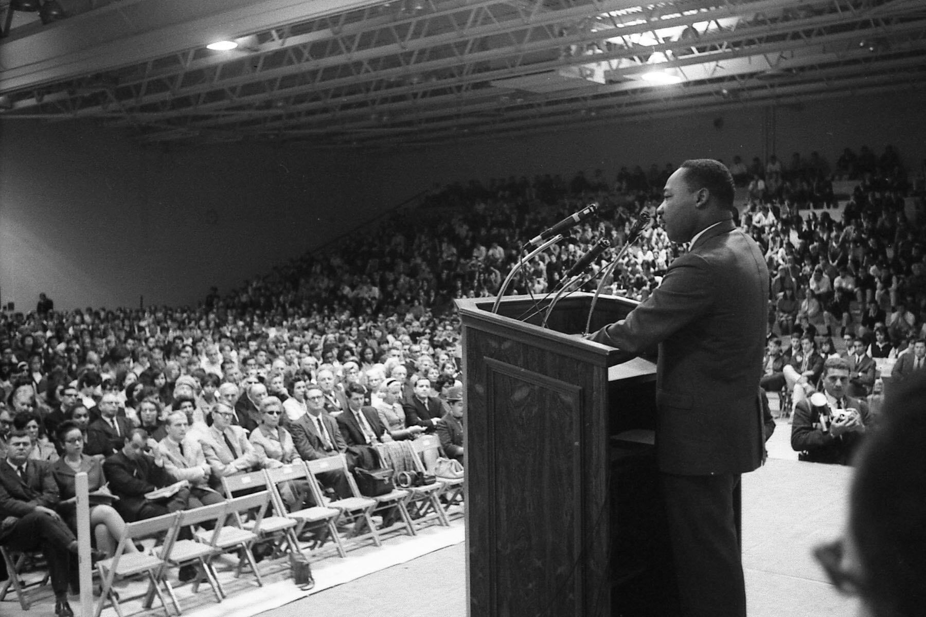 Martin Luther King Jr. speaking to a captive audience in Boylan Gymnasium