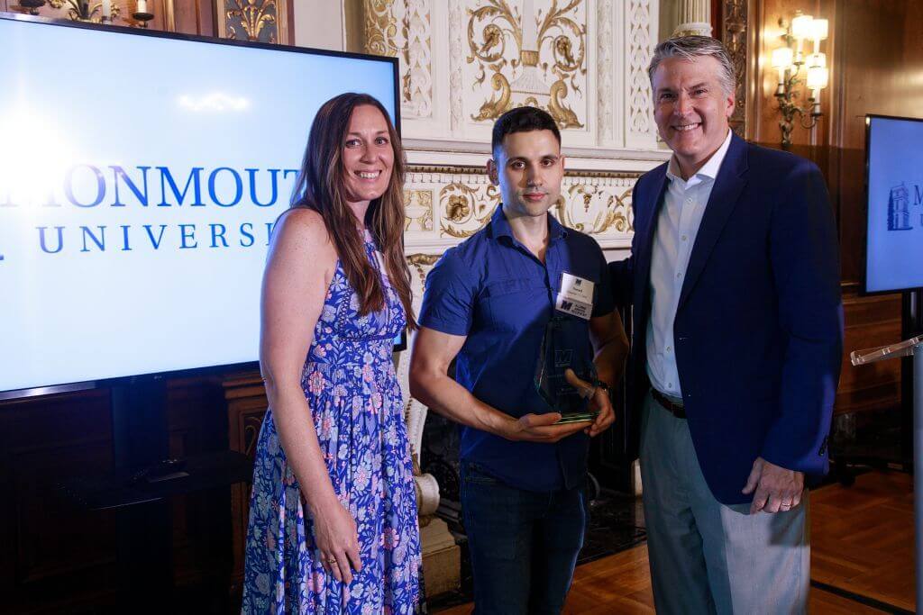 Patrick Leahy posing with Alumni Award recipient