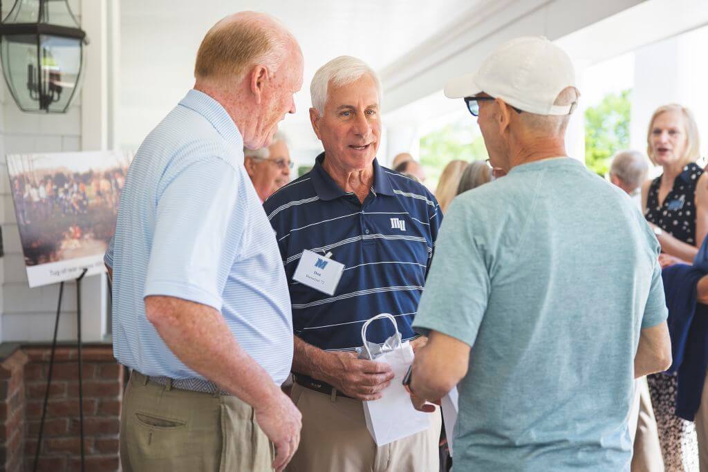 Don Burnaford speaking with guests at Alumni Weekend Brunch