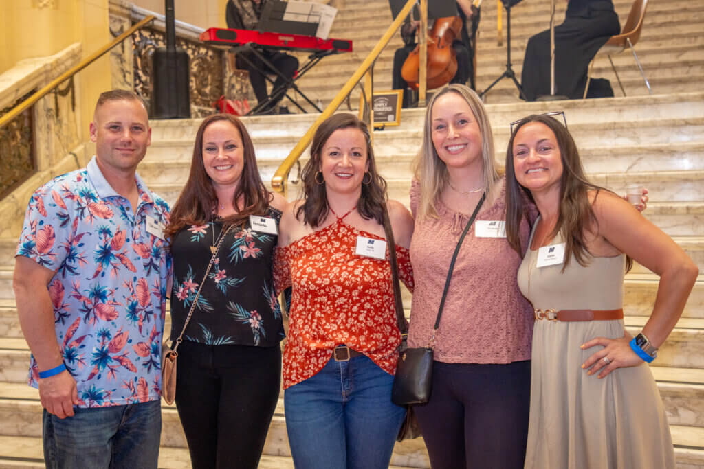 A group of alumni reconnecting at the event.