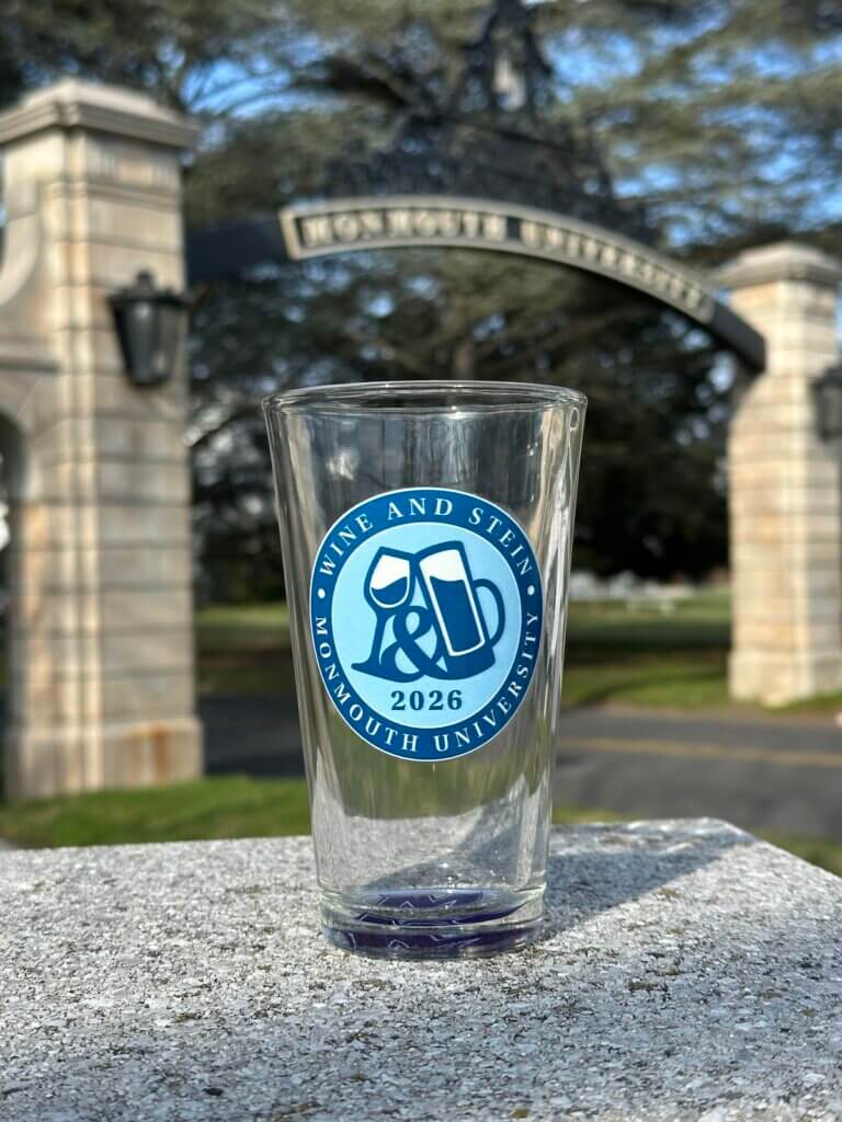 Commemorative Wine and Stein Glass, sat in front of the campus gateway