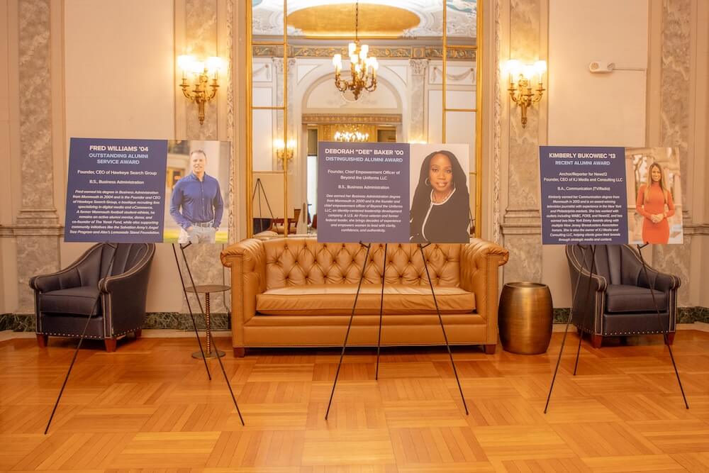 Three posters with the bios of each of the award winners.
