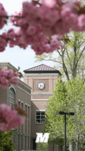 An outdoor clock on one of the buildings at Monmouth University