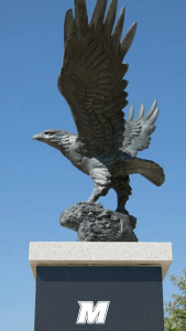 Statue of a hawk on the Monmouth campus