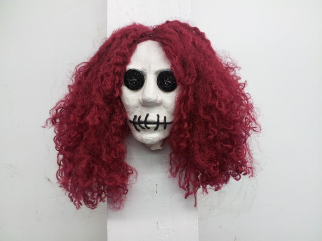 Self Portrait as a Rag Doll, Plaster, Yarn, and Buttons by Denice Michalchuk