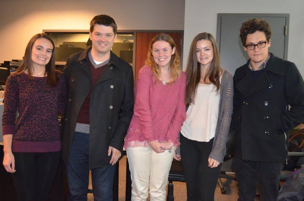 Photo of students with Students meeting with Phil Lord and Chris Miller before their MACE Award acceptance.