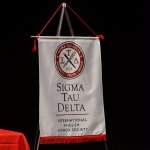 Photo shows Sigma Tau Delta banner