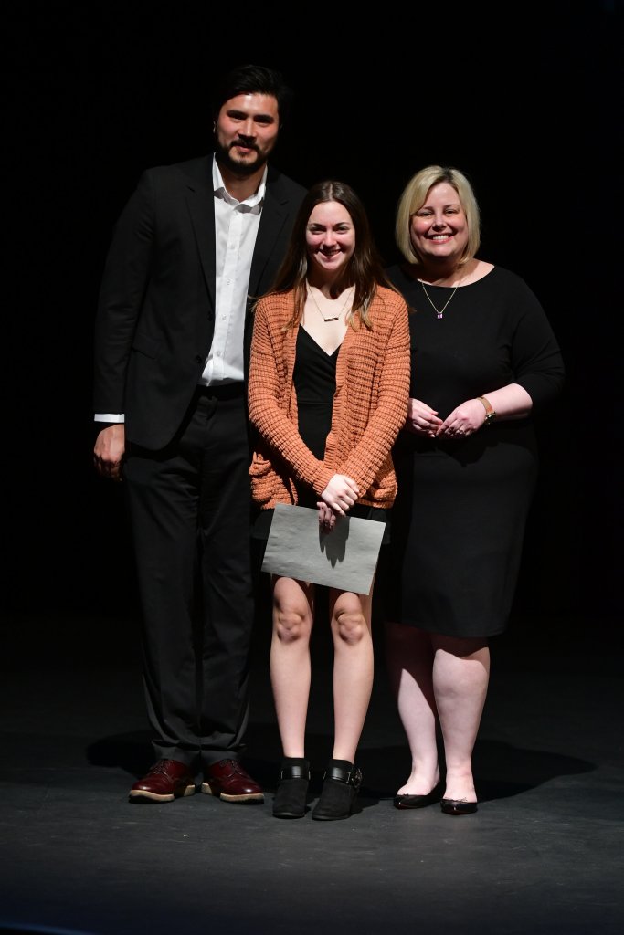 Photo shows Jessica Phillips (center) with Professors Gilvarry and Swanson