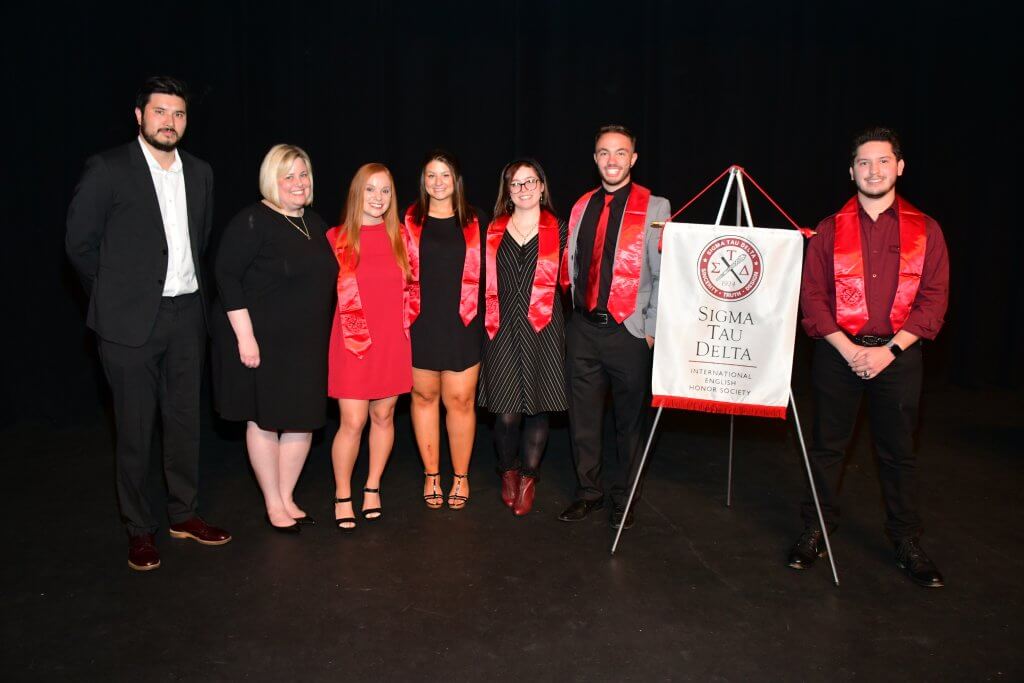 Photo shows Professors Gilvarry and Swanson with the a Sigma Chapter Executive Board members: (left to right) Morgan DeWinne, Faith Earl, Laurel Monks, Mike Padovani and Jason Aquino.