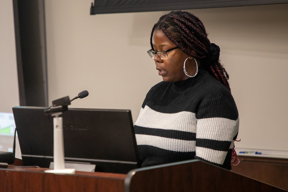 Woman speaking at podium