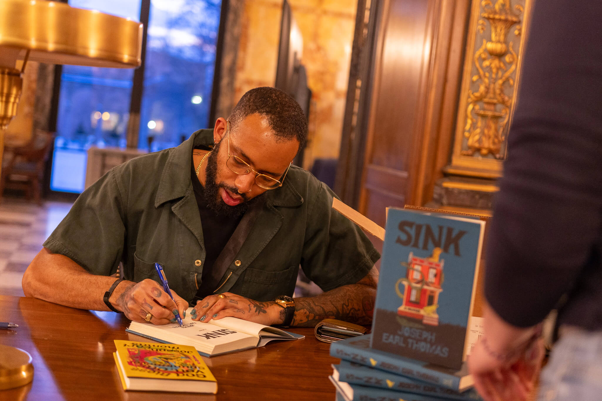 Man signing book