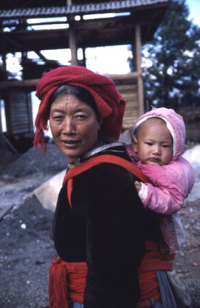Mosuo Woman with Baby on back