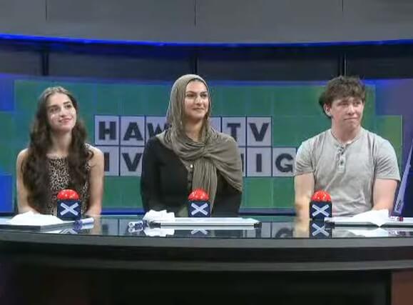 Three contestants of a game, buzzers by the three.