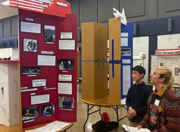 poster presentations in a large hall