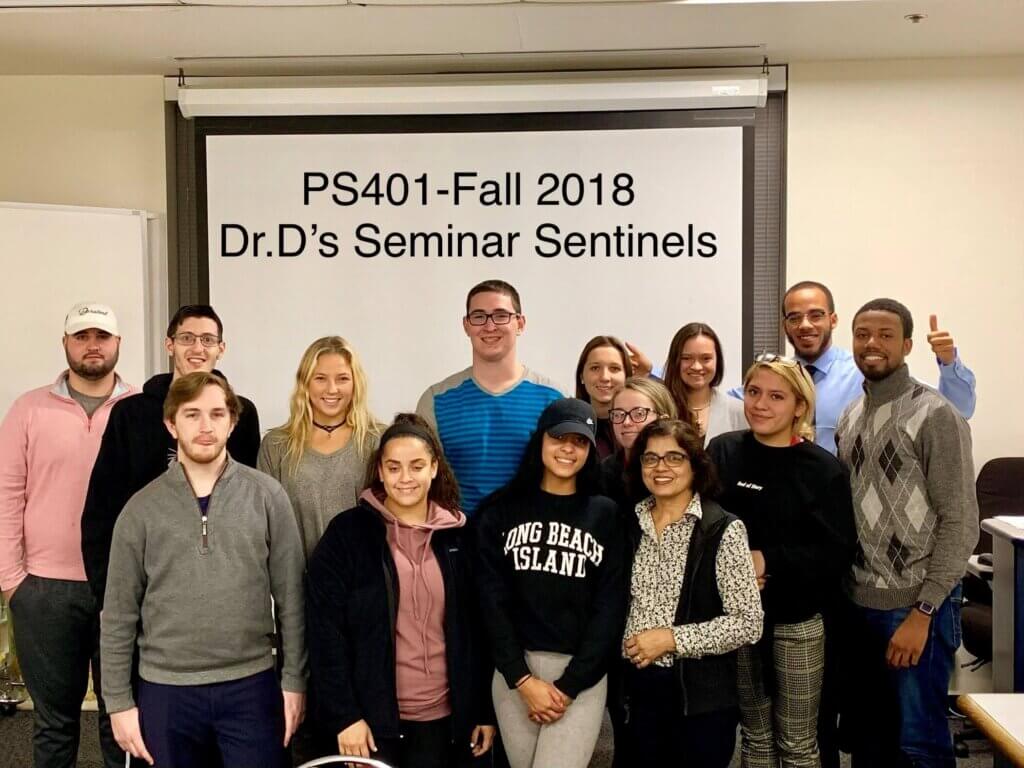 Group photo with text reading PS401-Fall 2018. Dr.D's Seminar Sentinels