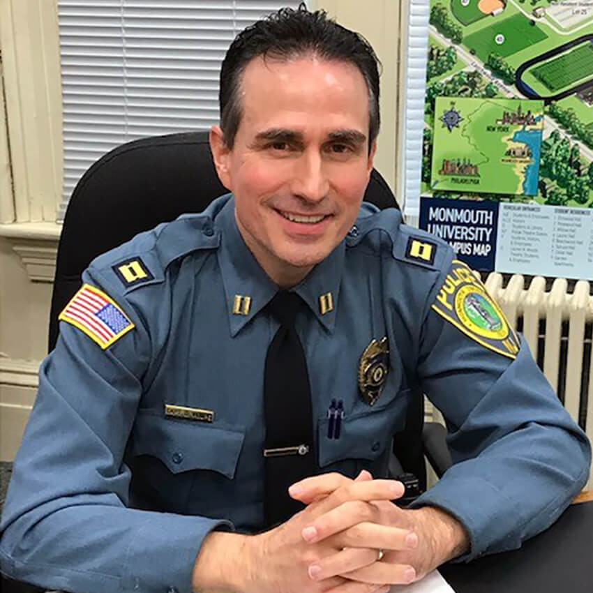 Photo of Dean Volpe at his desk