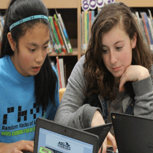 Photo of two female elementary school students studying