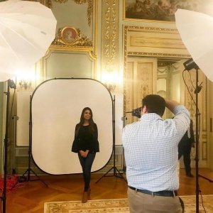 Photo of a student having her picture taken in Wilson Hall