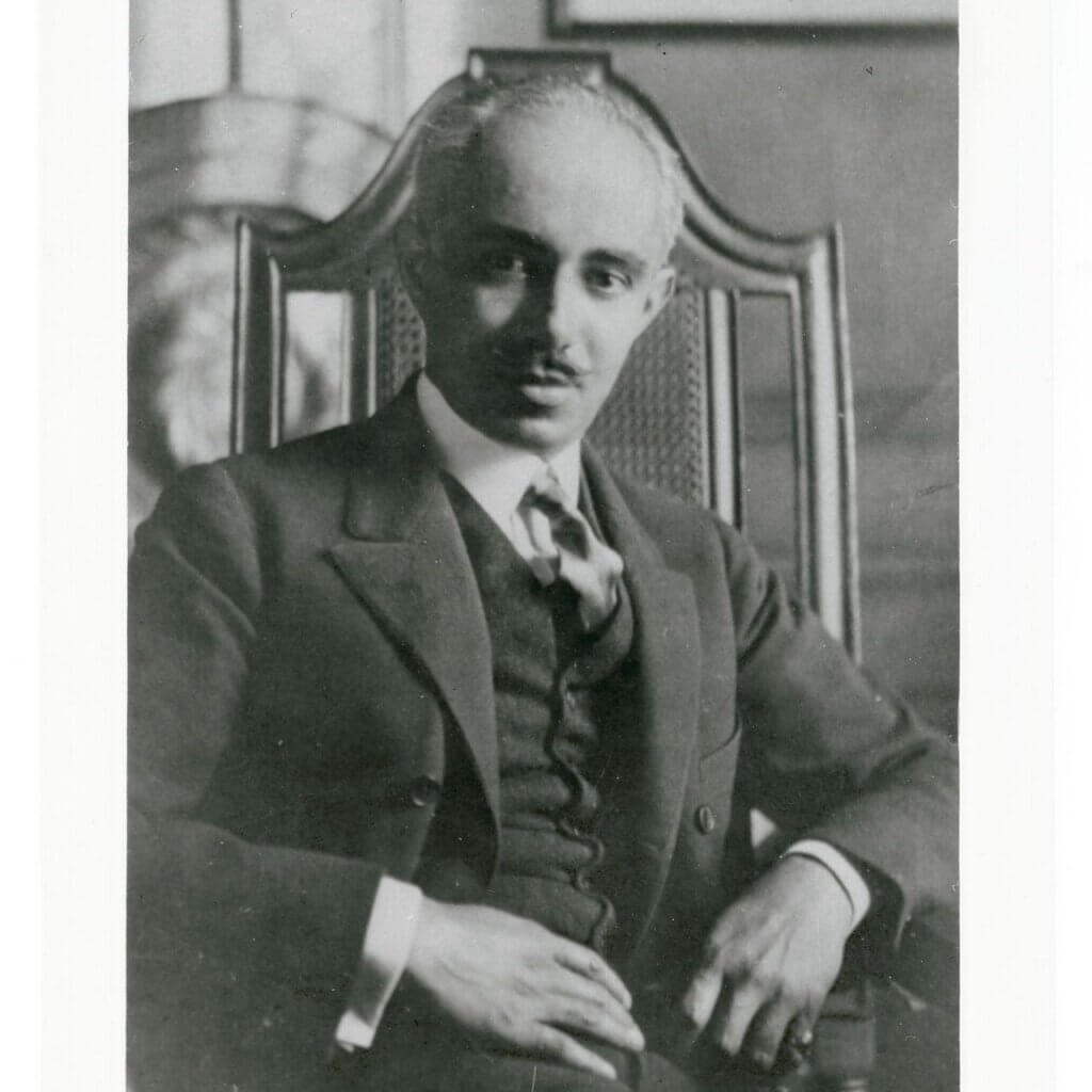 Old black and white photograph of Julian Abele sitting