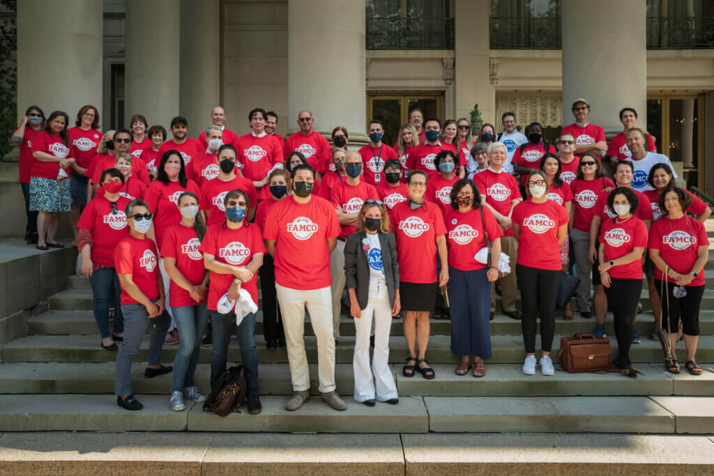 Photo of FAMCO members on the steps of the Great Hall