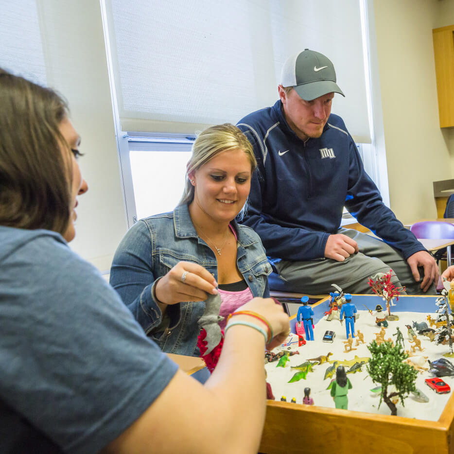 Student studying to become a certified play therapist