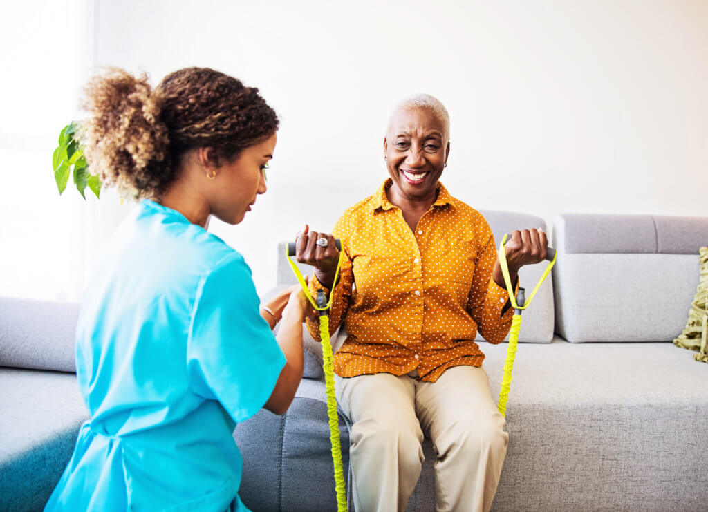 Photo of therapist working with patient