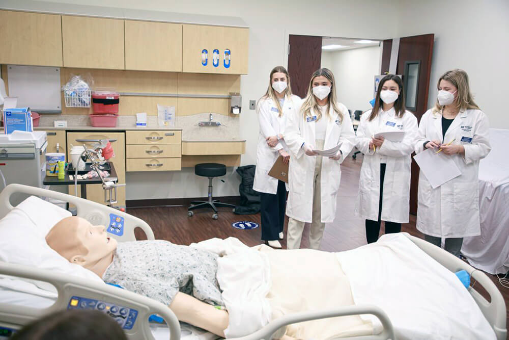 Speech-Language Pathology students study dysphagia patient in the simulation lab and learning center