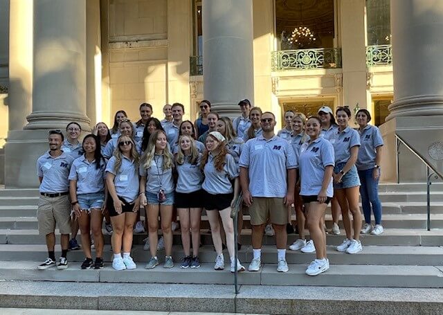 Peer Mentors on the steps of the Great Hall