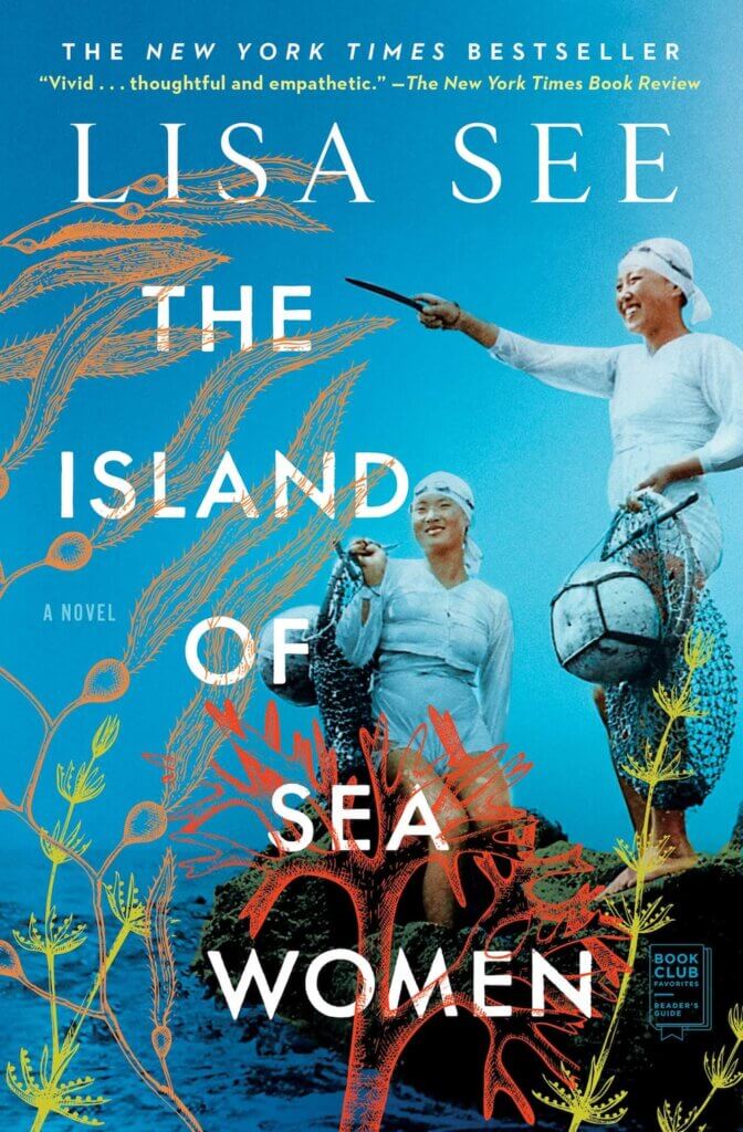Lisa See, The Island of Sea Women. Book cover, showing two women with fishing gear walking on large rocks, surrounded by ocean.