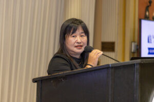 A speaker at the lectern