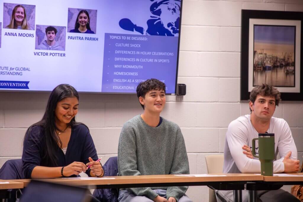 Three students seated