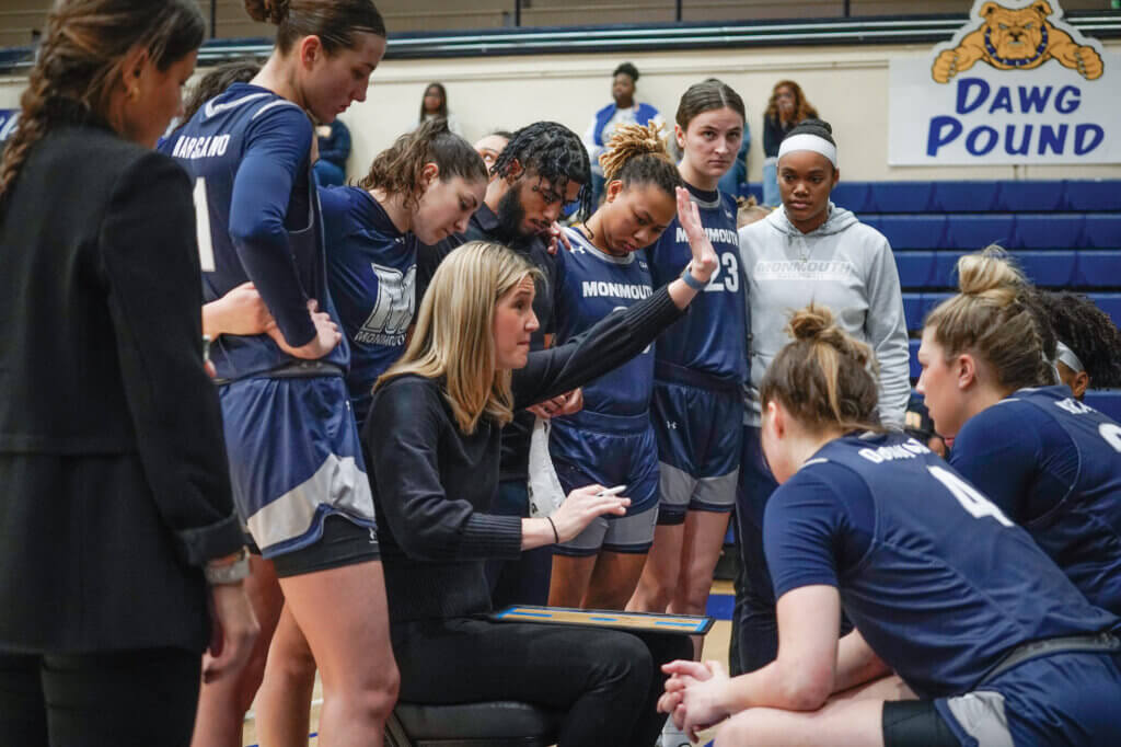 Coach Ginny Boggess talks with her squad during a February game against CAA foe North Carolina A&T.