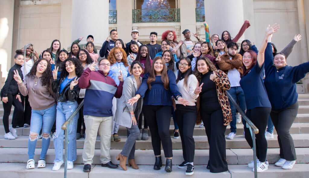 a group of first-generation students standing on the Great Hall steps