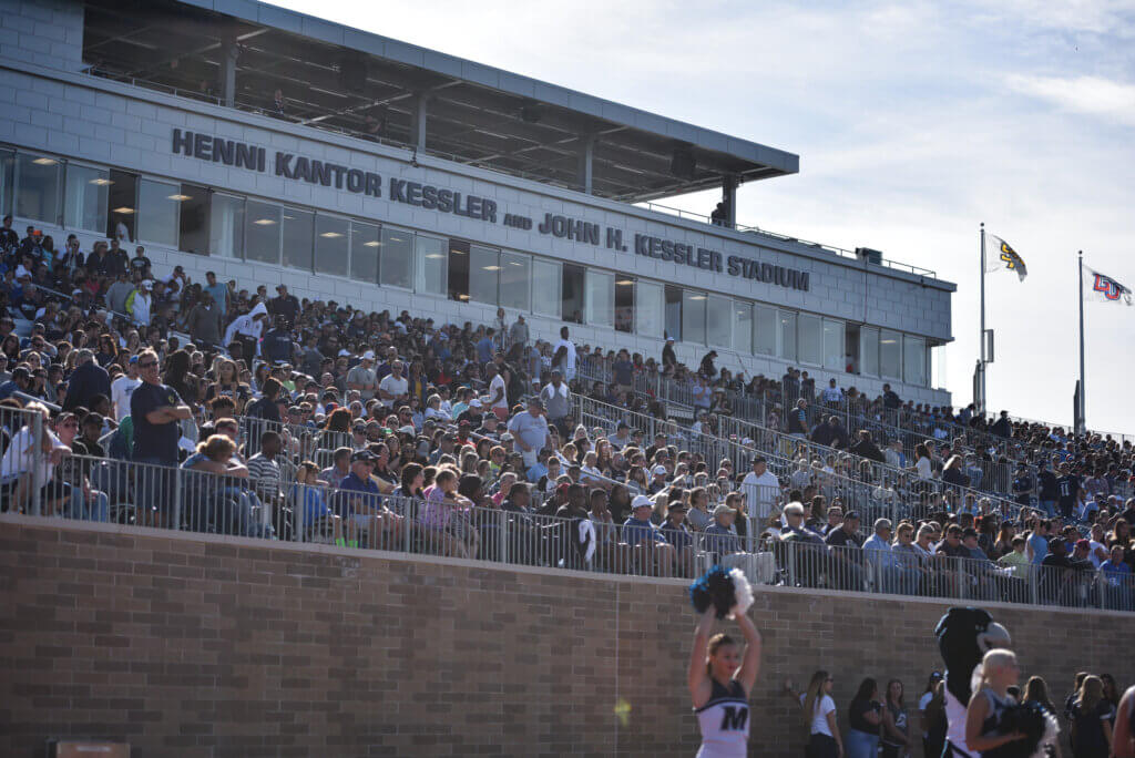 fans in the Kessler Stadium stands
