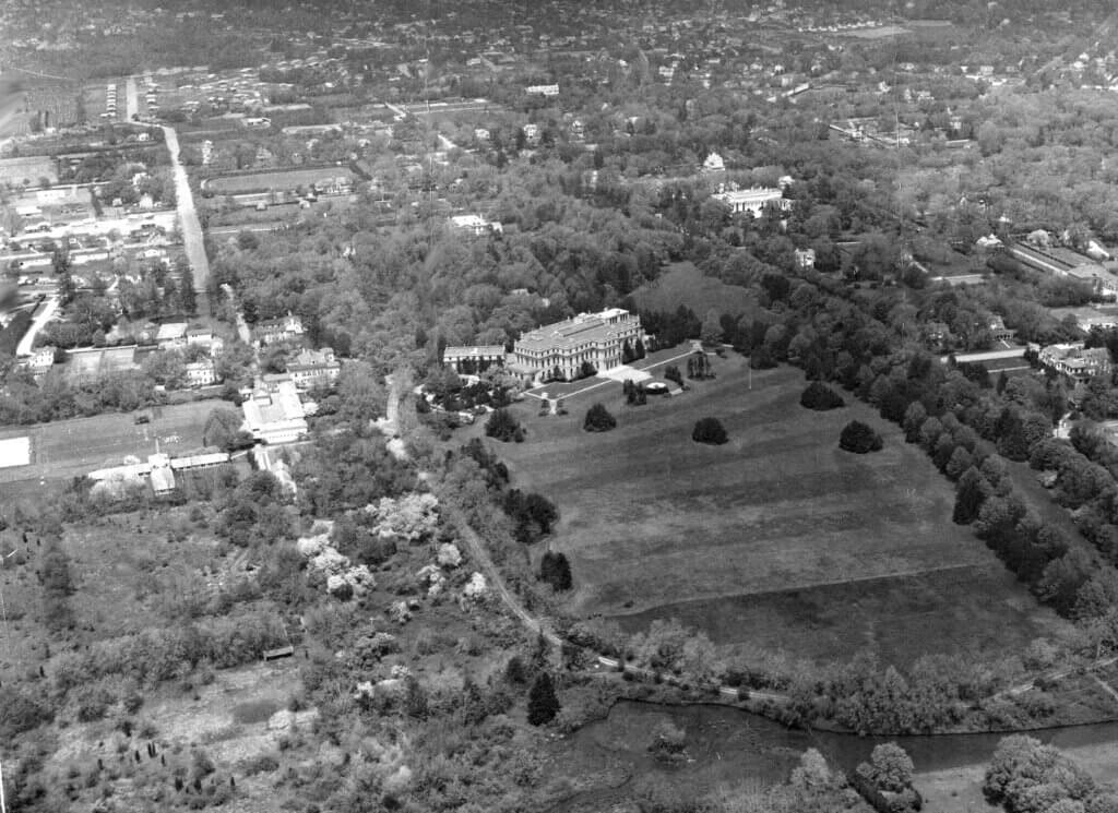 an archival aerial photo of the Monmouth campus and surrounding area, circa 1956