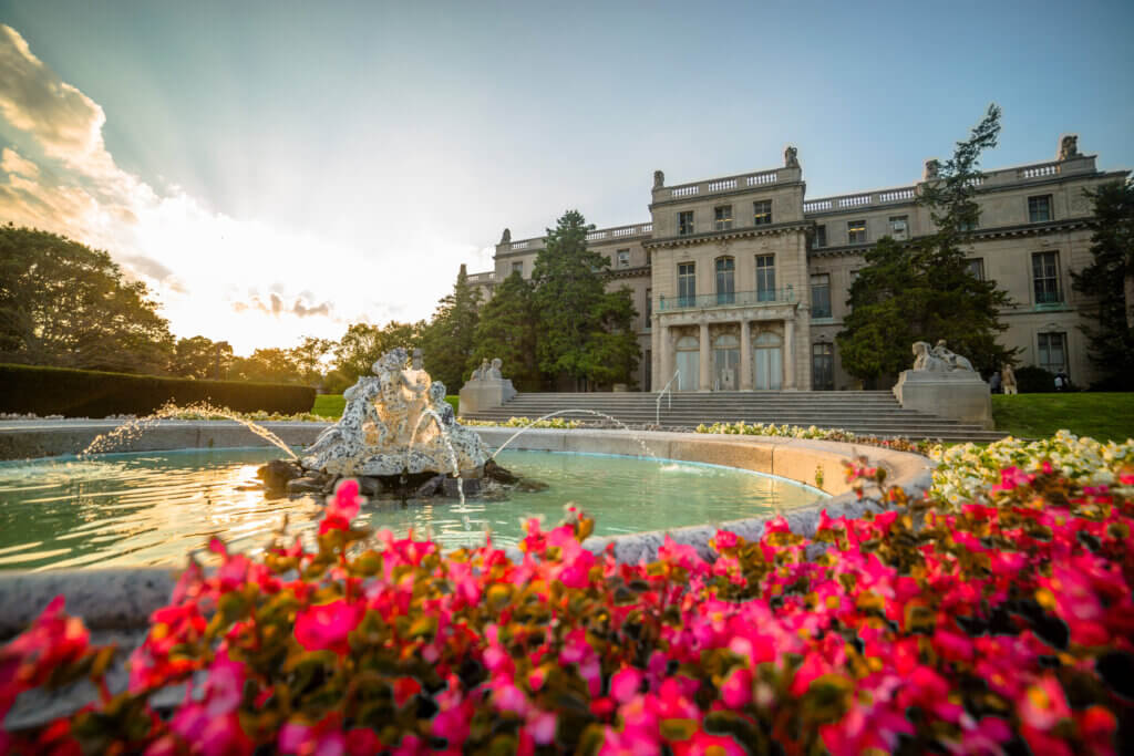 The south side of the Great Hall at sunset, with the fountain in the foreground