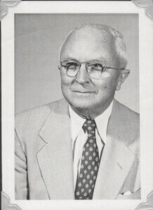 An old, black and white photo of Haslam Slocum. 