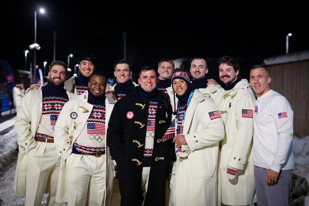 Bryan Sosoo (third from left) stands with the U.S. men’s bobsled team and head coach Chris Fogt before the Olympic opening ceremony.
