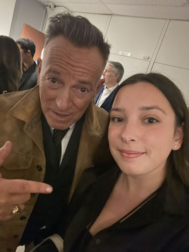 Abigail Garcia poses for a selfie with Bruce Springsteen at a Monmouth University event