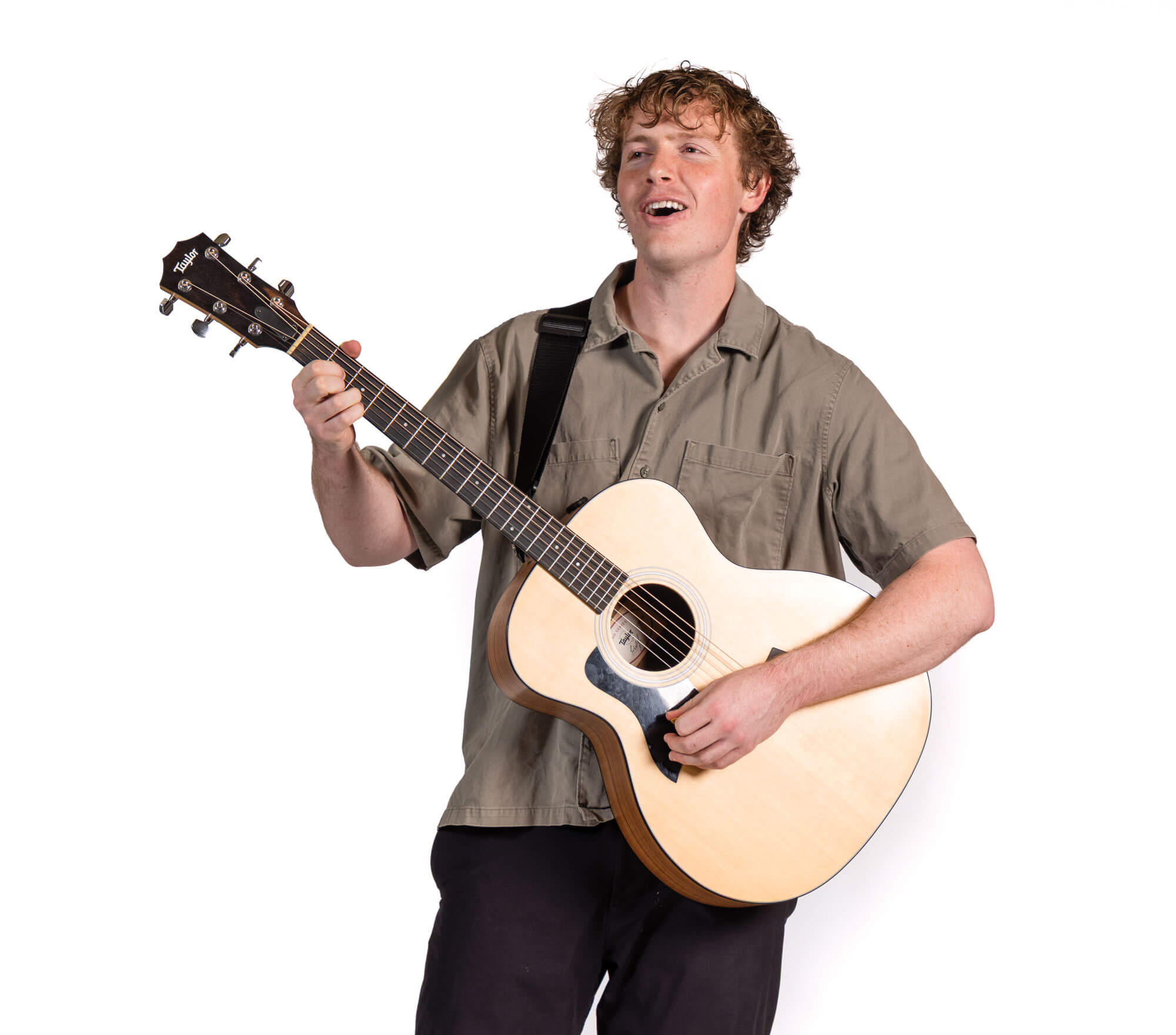 Will Horn playing an acoustic guitar