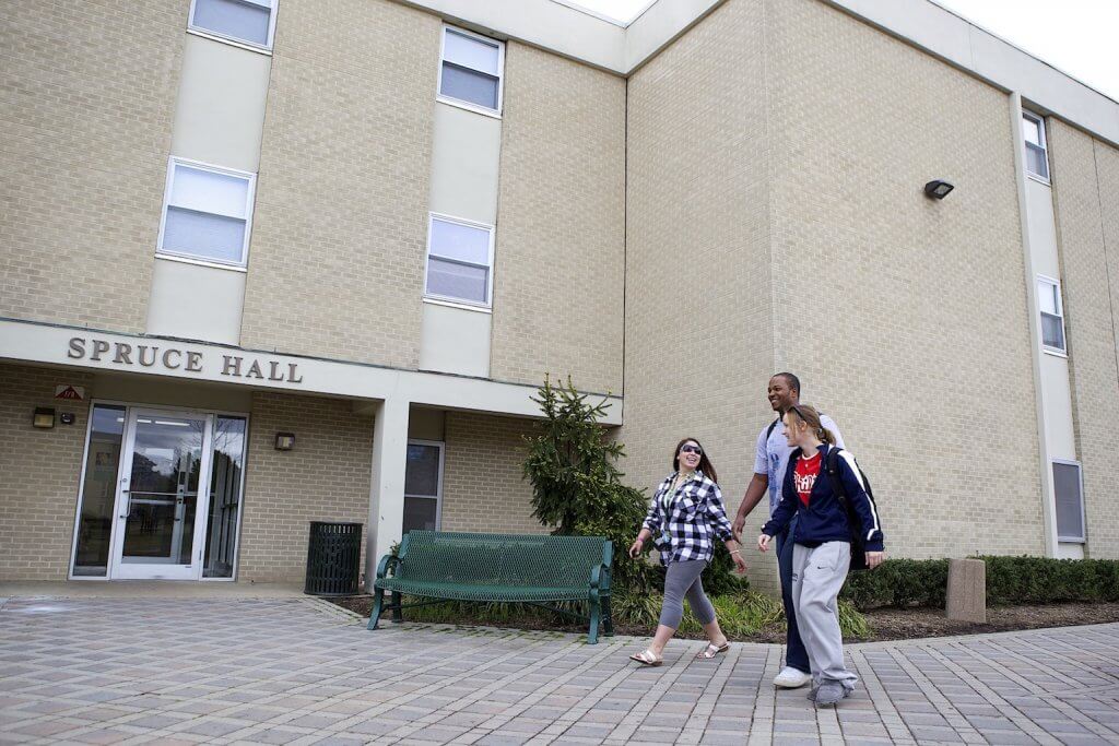 Students Walking Outside Spruce Hall
