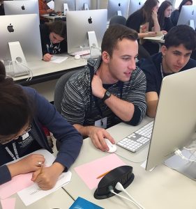 Photo shows high school programmers work during a previous competition hosted by Monmouth University's Department of Computer Science and Software Engineering.
