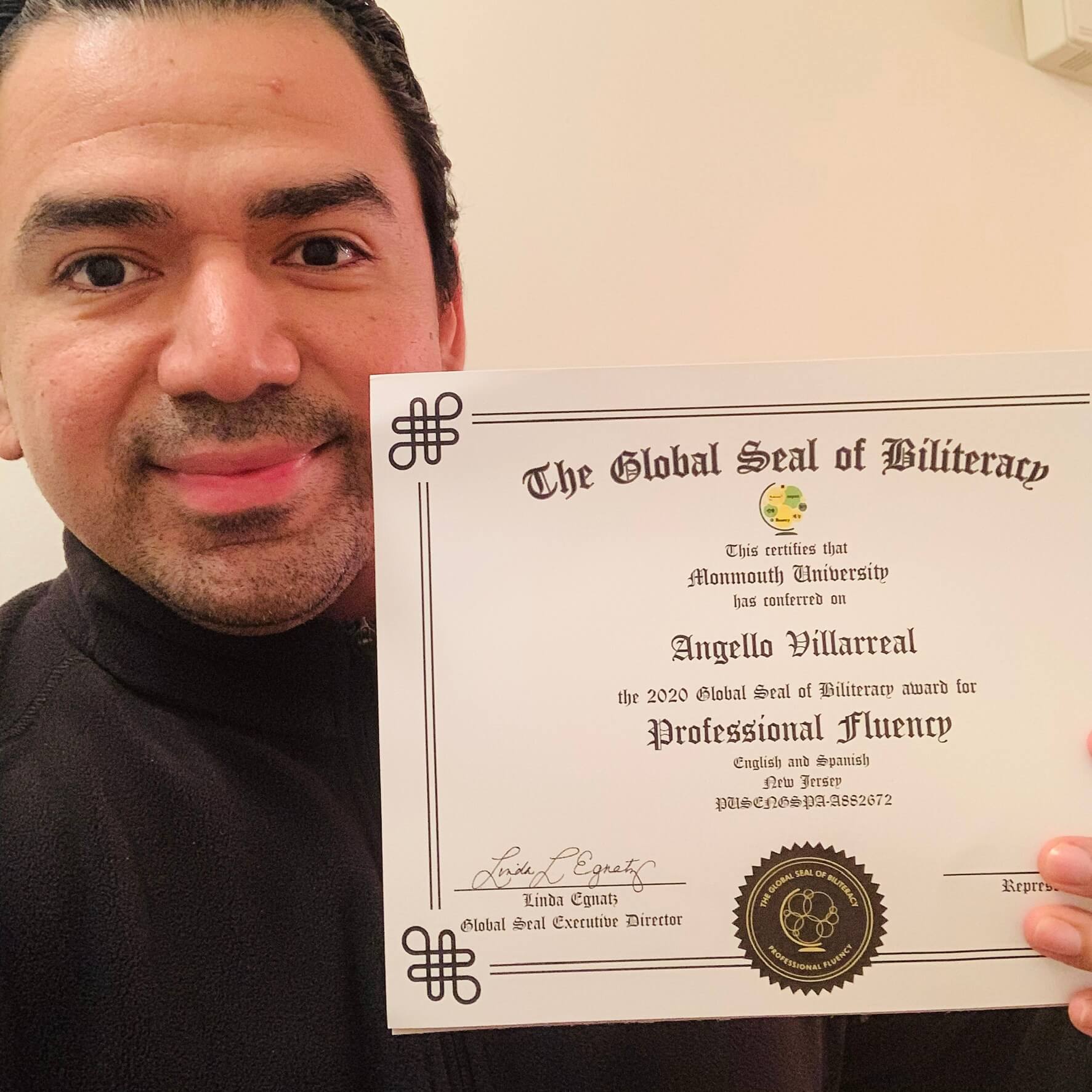 Villareal displays his Global Biliteracy Award