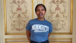 Female student wearing Monmouth University shirt