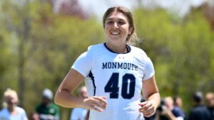 Woman wearing lacrosse jersey with number 40 on front