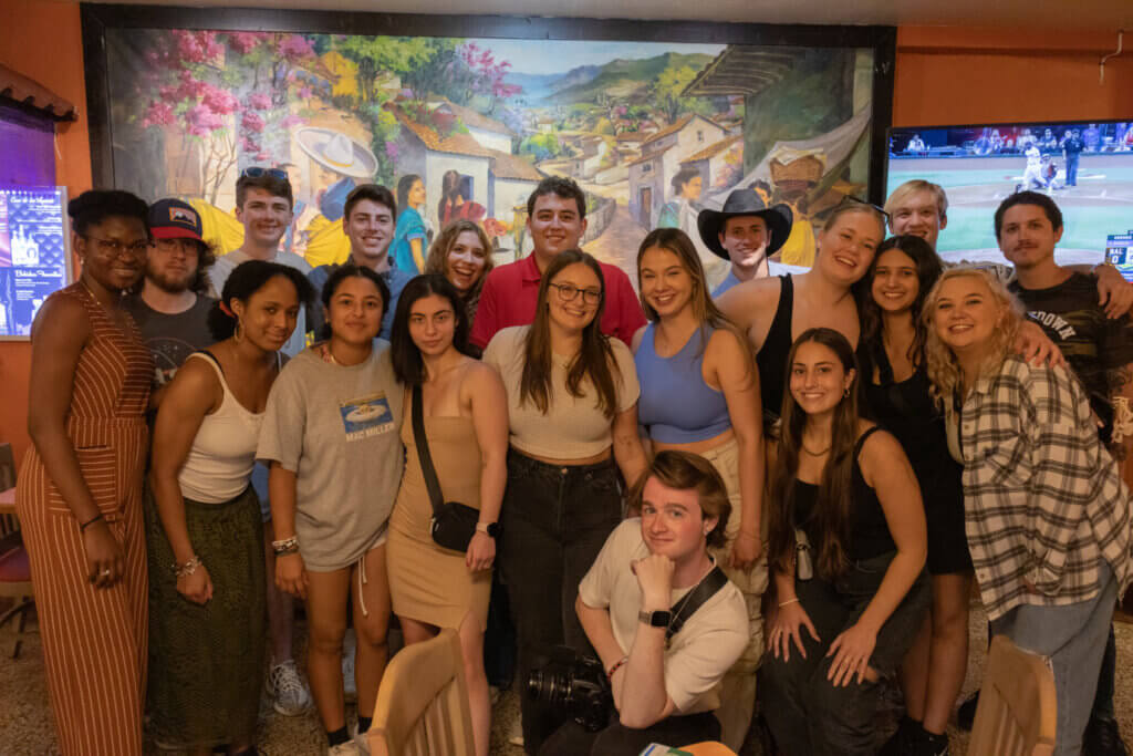 Group photo of the Monmouth University debate team