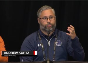 Man with beard speaking: Andrew Kurtz