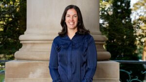 Director of Athletics at Monmouth University Jennifer Sansevero poses for headshot outside the Great Hall
