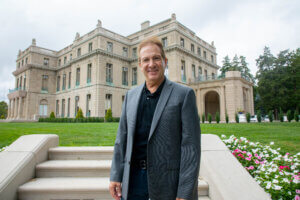 Headshot of Professor Joe Rapolla with the Great Hall in the background